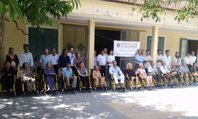 American Wheelchair Mission and Caritas Hue give wheelchairs to people with disabilities